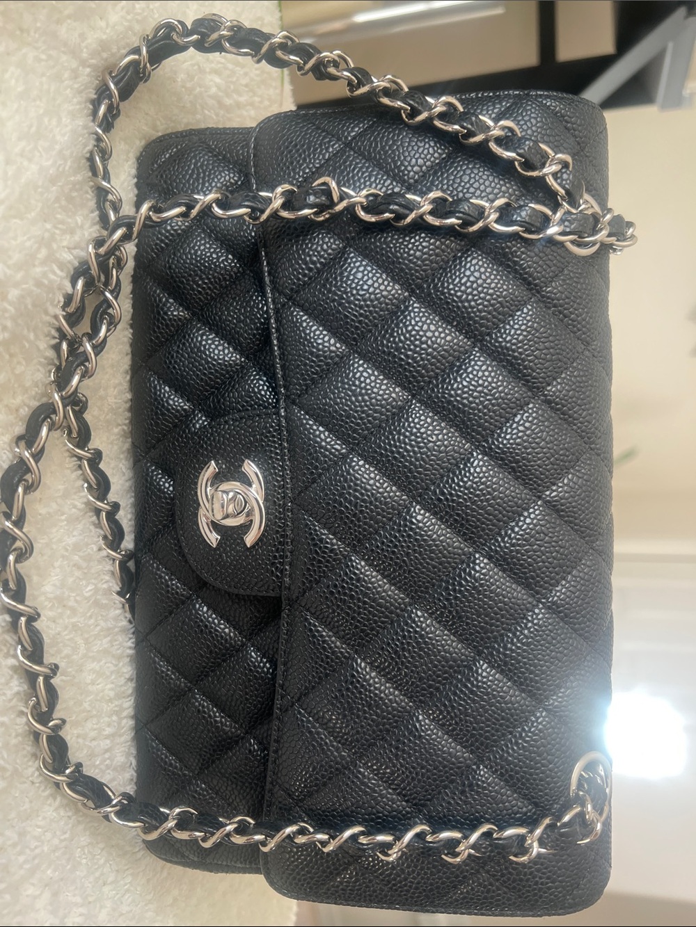 CHANEL Black Quilted Caviar Leather Shoulder Bag with Silver Chain